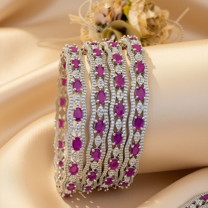 Set of 6 silver-tone wave bangles with pink oval zircon stones – copper/brass fashion jewelry