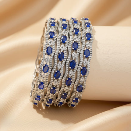 Set of 6 silver-tone openwork bangles with green zircon stones – copper/brass fashion jewelry