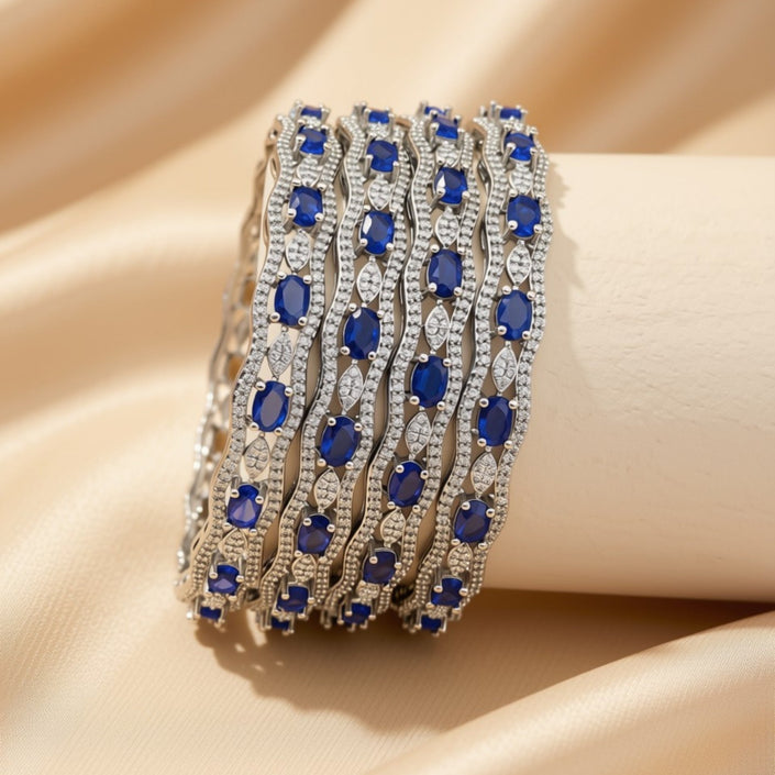 Set of 6 silver-tone openwork bangles with green zircon stones – copper/brass fashion jewelry