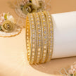 Set of 8 slim silver-tone bangles with leaf marquise zircon stones – copper/brass fashion jewelry