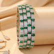 Set of 4 wide silver-tone bangles with double-row navy blue emerald-cut zircon stones – copper/brass fashion jewelry