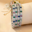 Set of 6 silver-tone wave bangles with marquise emerald green zircon stones – copper/brass fashion jewelry