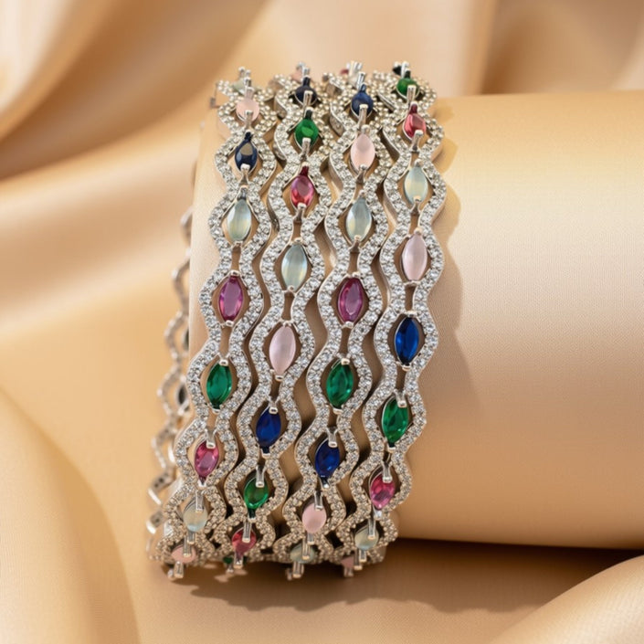 Silver-tone openwork bangles with colored zircon stones – copper/brass fashion jewelry