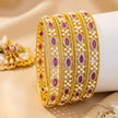 Set of 4 slim gold-tone bangles with ruby and pearl grid pavé pattern – copper/brass fashion jewelry