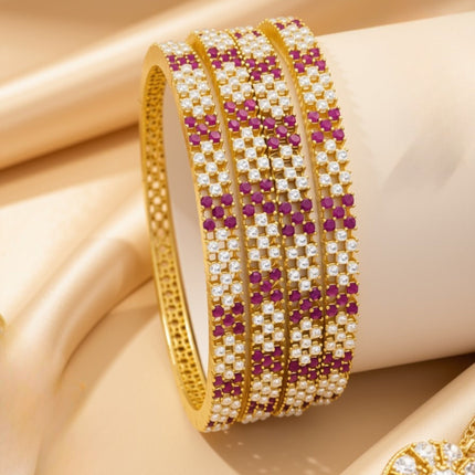 Gold-tone statement bangles with colored zircon stones – copper/brass fashion jewelry