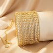 Set of 4 silver-tone bangles with ruby triangle and clear round zircon chevron pattern – copper/brass fashion jewelry