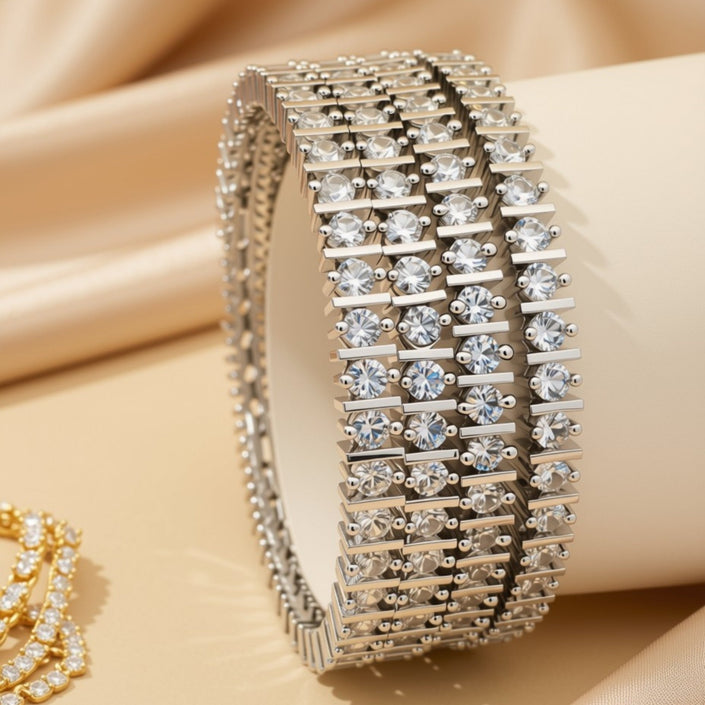 Set of 4 wide gold-tone open-work bangles with geometric triangle outlines in round clear zircon pavé – copper/brass fashion jewelry